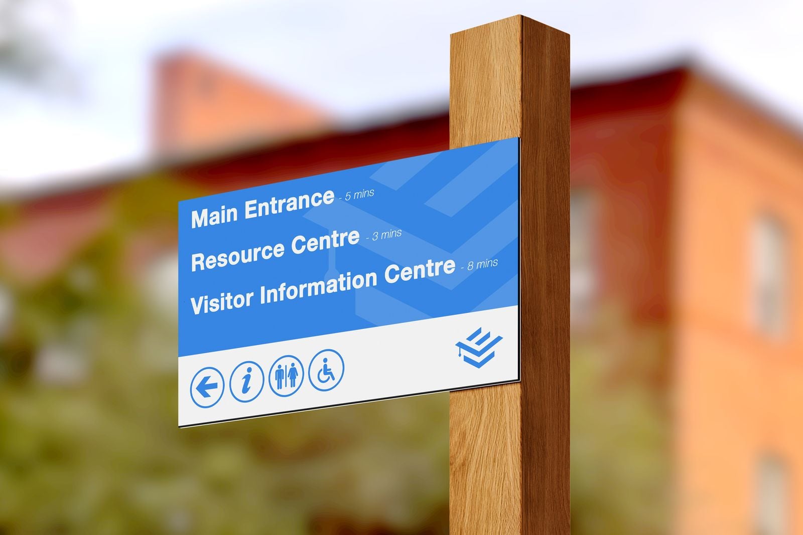 Blue wayfinding sign mounted on a wooden post