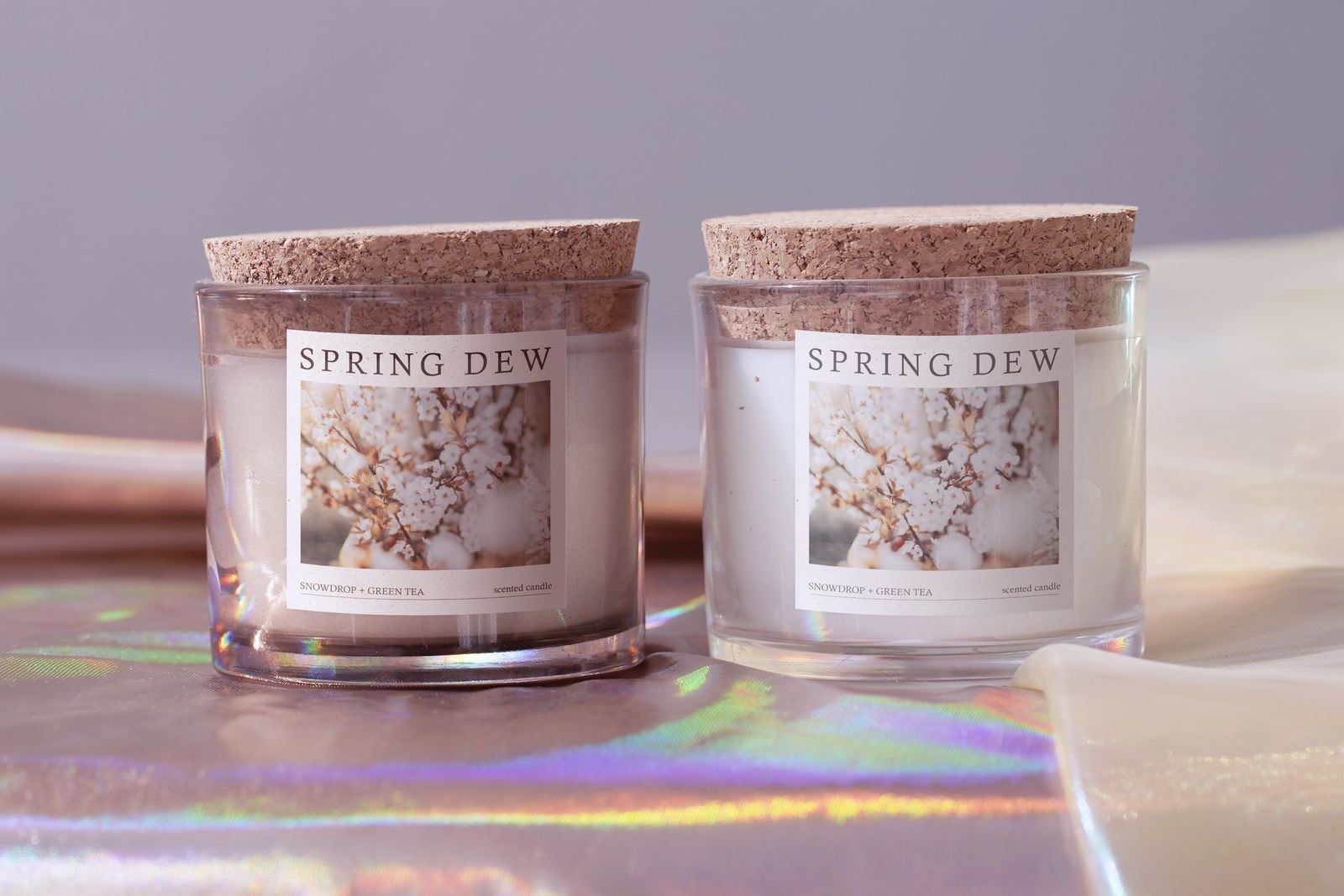 Two candle jars with square printed labels