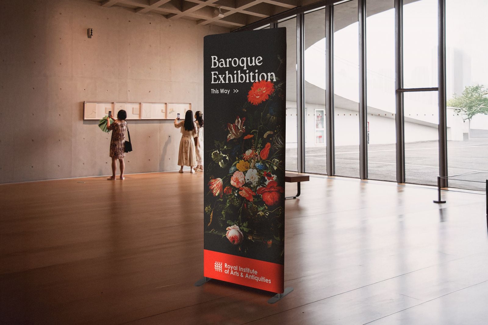Stretch fabric banner pointing the way to a Baroque exhibition in a gallery