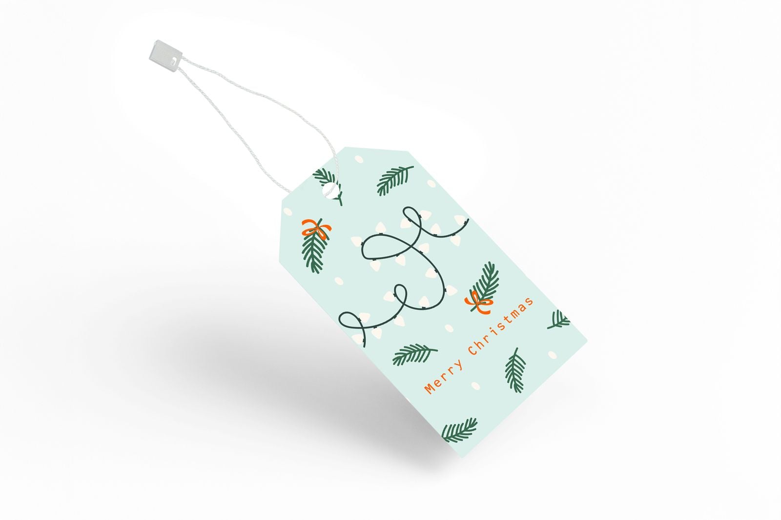 Christmas parcel tag with angled corners on a string loop
