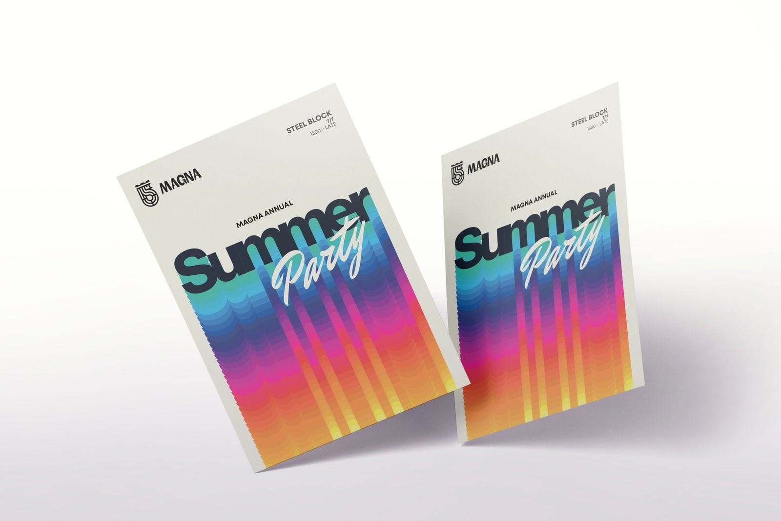 Two rainbow “Summer Party” invitations standing on a white surface