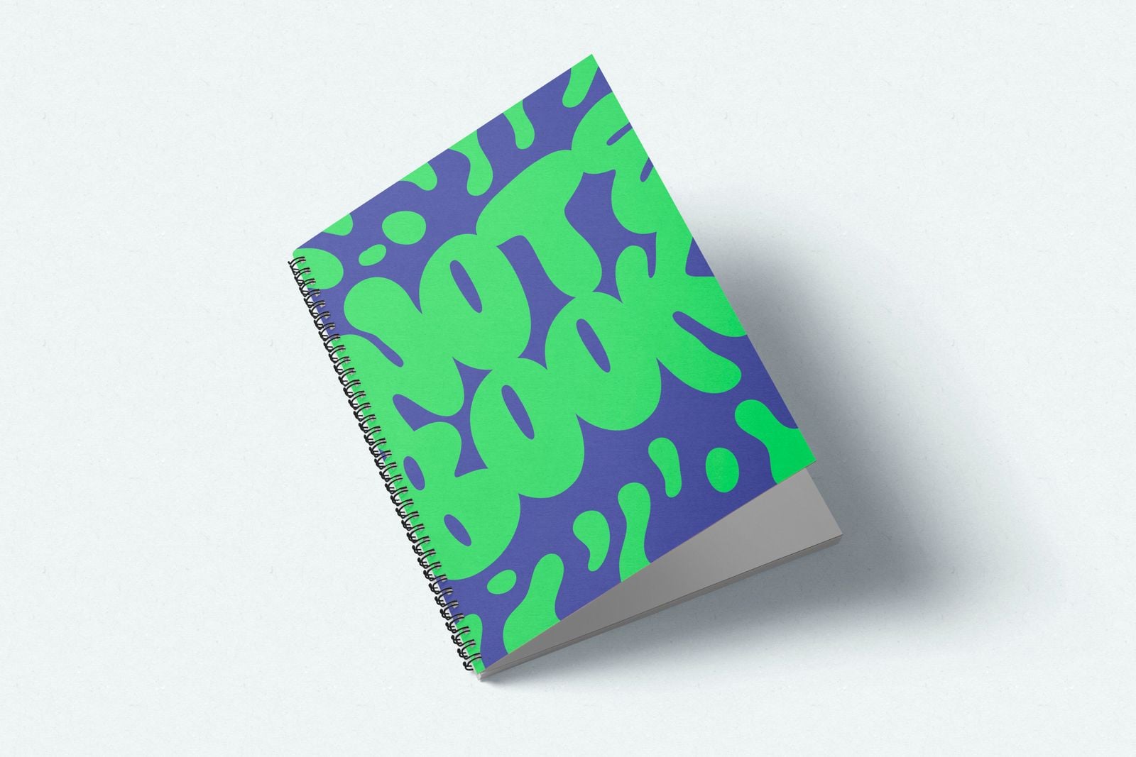 Wiro notebook with a bold green and purple lettered cover