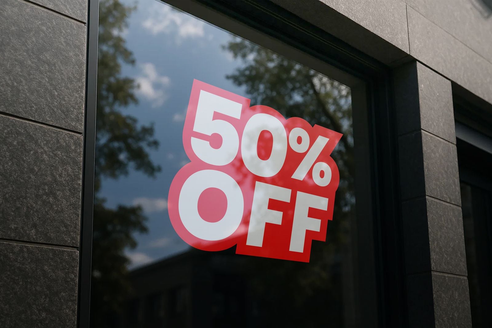 “50% off” sale window cling on shop glass